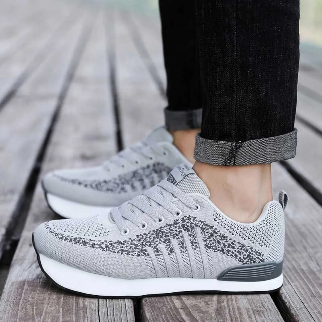 Grey stripe pattern texture negative heel rocker sneaker