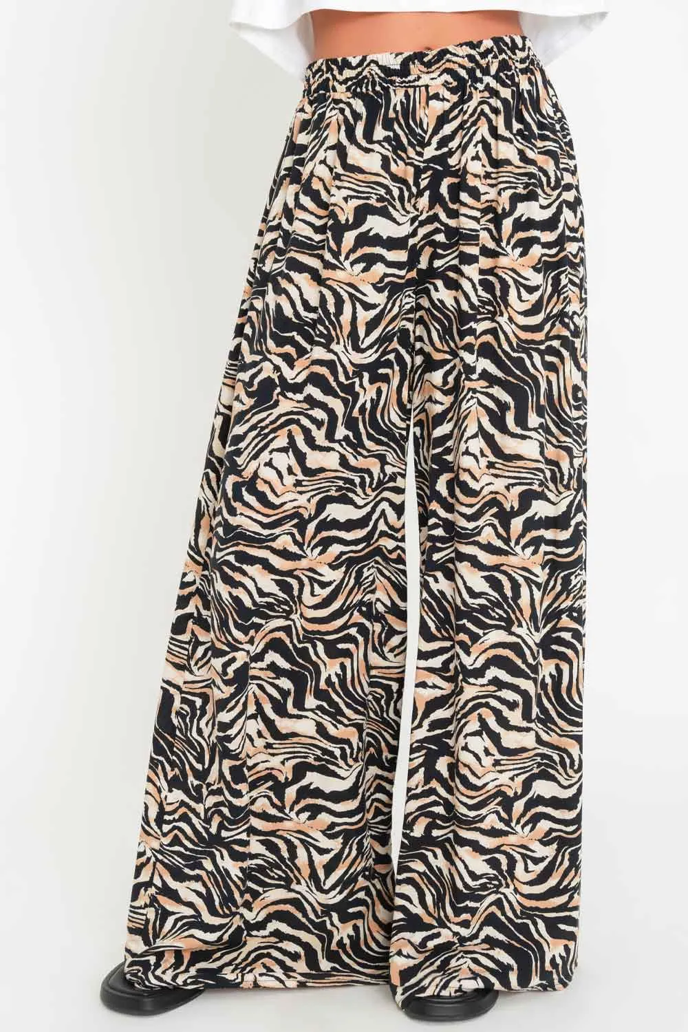 Pantalón animal print de fit palazzo cintura alta