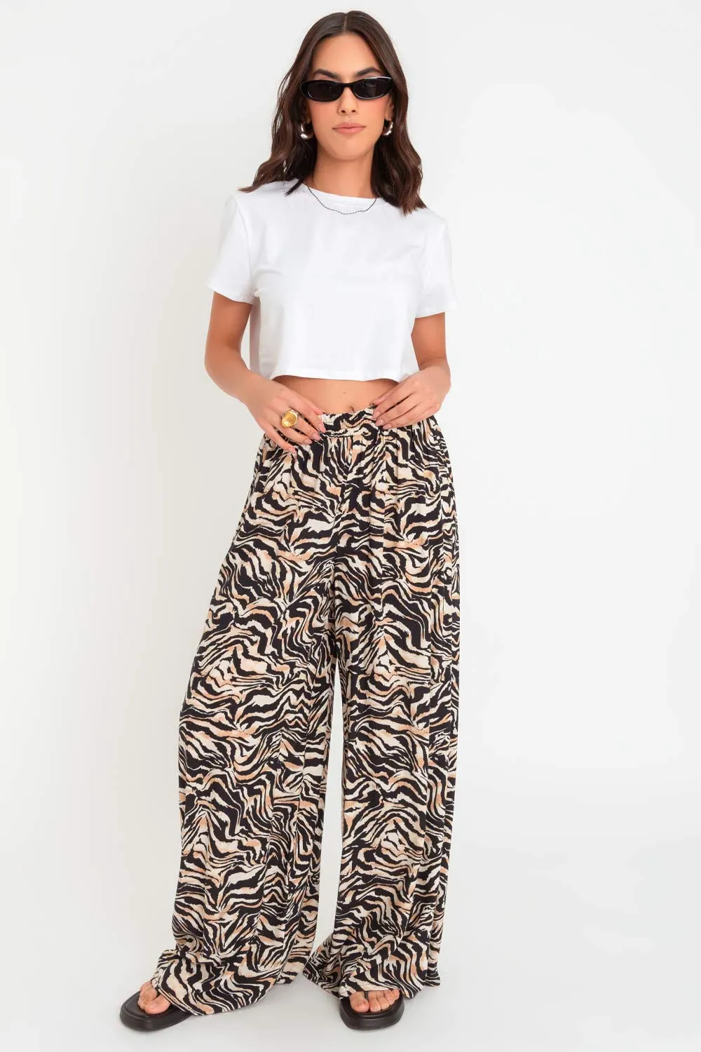 Pantalón animal print de fit palazzo cintura alta