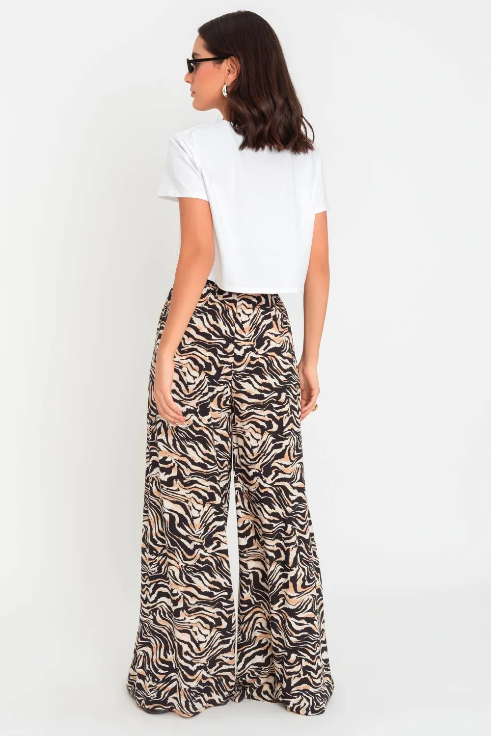 Pantalón animal print de fit palazzo cintura alta