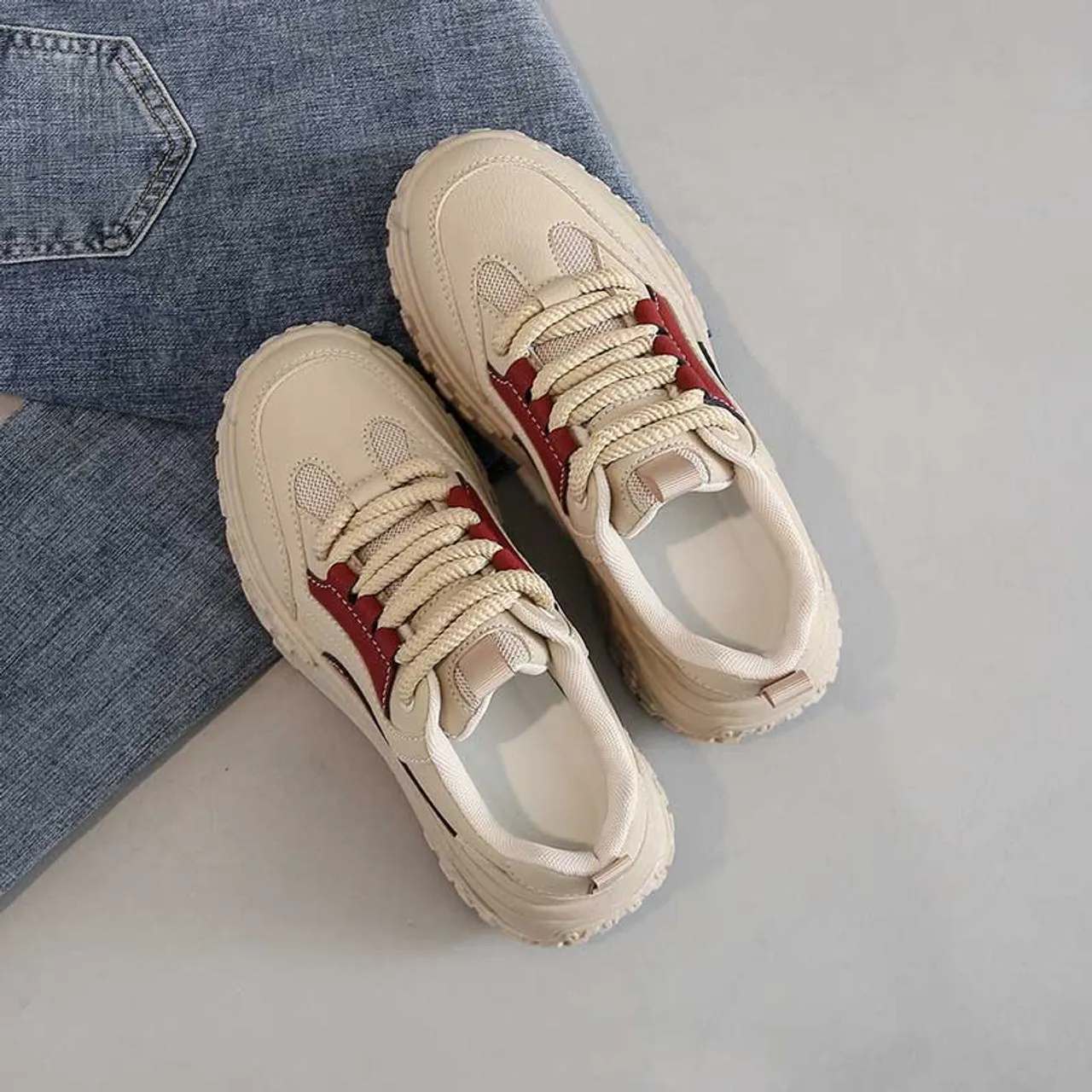 Red casual thread accents shoe sneaker