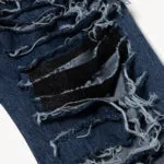 Slashed Vinyl Jeans